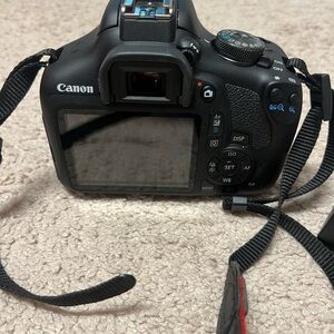 Canon Black Digital Camera with LCD Screen and Textured Grip